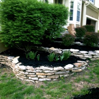 Residential Releaf - a stone wall in the front yard - Landscaping Near Me Residential Releaf - a stone wall in the front yard - Landscaping Near Me