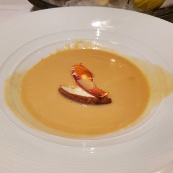 Eddie V's Prime Seafood - Tableside Lobster Bisque with a chunk of lobster and toasted bread - Seafood Near Me - Plano, Texas Eddie V's Prime Seafood - Tableside Lobster Bisque with a chunk of lobster and toasted bread - Seafood Near Me - Plano, Texas