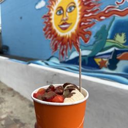 Bjuiced - Bmore bowl - açaí, granola, bananas, strawberries and cacao drizzle for toppings. Replaced açaí with mango sorbet