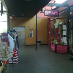 Zazzy - Zazzy storefront and rack.