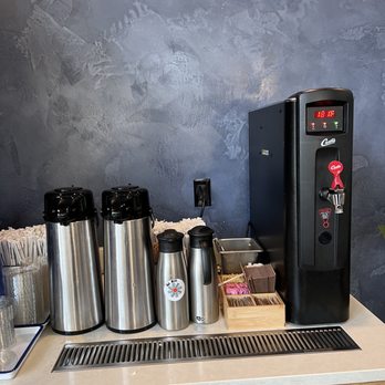 Tanaka - a coffee machine and a coffee maker on a counter - Japanese Near Me - Tigard, Oregon Tanaka - a coffee machine and a coffee maker on a counter - Japanese Near Me - Tigard, Oregon