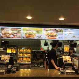 a man ordering food at the counter