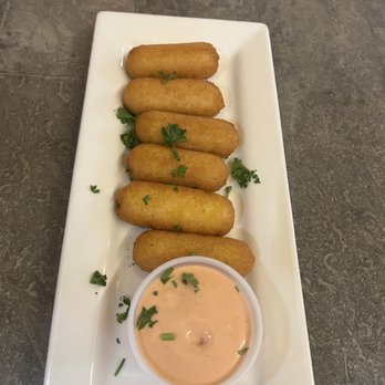 Metropol Restaurant & Bar - Corn sticks theirs an official name but man are these tasty! - Puerto Rican Near Me - Miami, Florida Metropol Restaurant & Bar - Corn sticks theirs an official name but man are these tasty! - Puerto Rican Near Me - Miami, Florida
