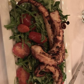 Cafe Santorini - Grilled octopus salad fresh arugula citrus dressing on a bed of black lentils - Italian Near Me - Pasadena, California Cafe Santorini - Grilled octopus salad fresh arugula citrus dressing on a bed of black lentils - Italian Near Me - Pasadena, California