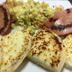 Cafe Y Canela Colombian Restaurant - Huevos pericos con arepa con queso y Jamon