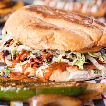 Tequileros Taqueria - a sandwich on a checkered plate - Mexican Near Me - Lodi, California Tequileros Taqueria - a sandwich on a checkered plate - Mexican Near Me - Lodi, California
