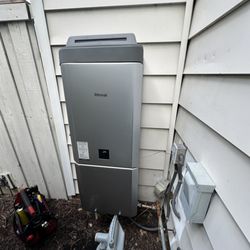 Dr Plumber - Rinnai outdoor tankless done in Norfolk.