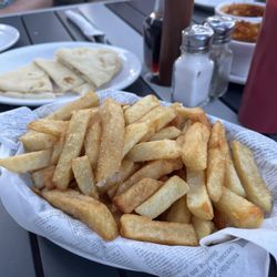 Churchill Arms - Additional chips and pitas for our curry platter to finish our sauces.