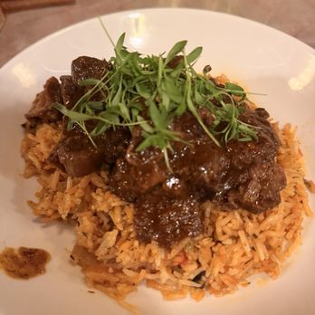 Unknown - Flame Awaze Braised Ribs with creole dirty rice - 8/10 - Cocktail Bars Near Me - Atlanta, Georgia Unknown - Flame Awaze Braised Ribs with creole dirty rice - 8/10 - Cocktail Bars Near Me - Atlanta, Georgia