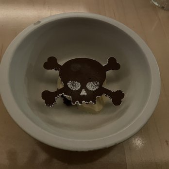 Cabaret L'enfer - a skull and crossbone in a bowl - Wine Bars Near Me - Montreal, Quebec