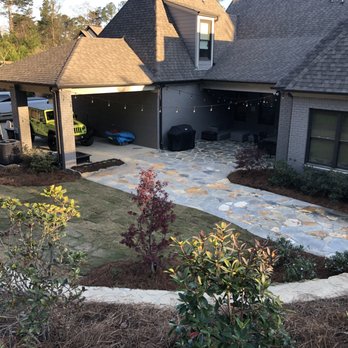 Steven's Wack-n-Sack - ows a view of a home with a stone patio - Lawn Services Near Me - Maylene, Alabama Steven's Wack-n-Sack - ows a view of a home with a stone patio - Lawn Services Near Me - Maylene, Alabama