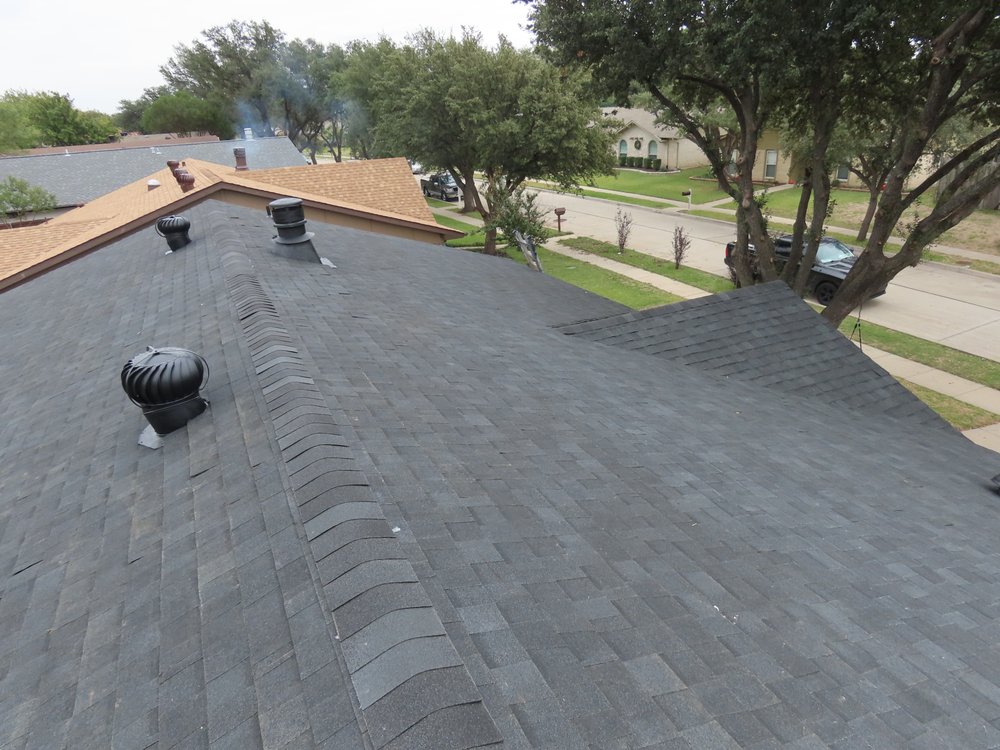 Slide of Solotzo Roofing