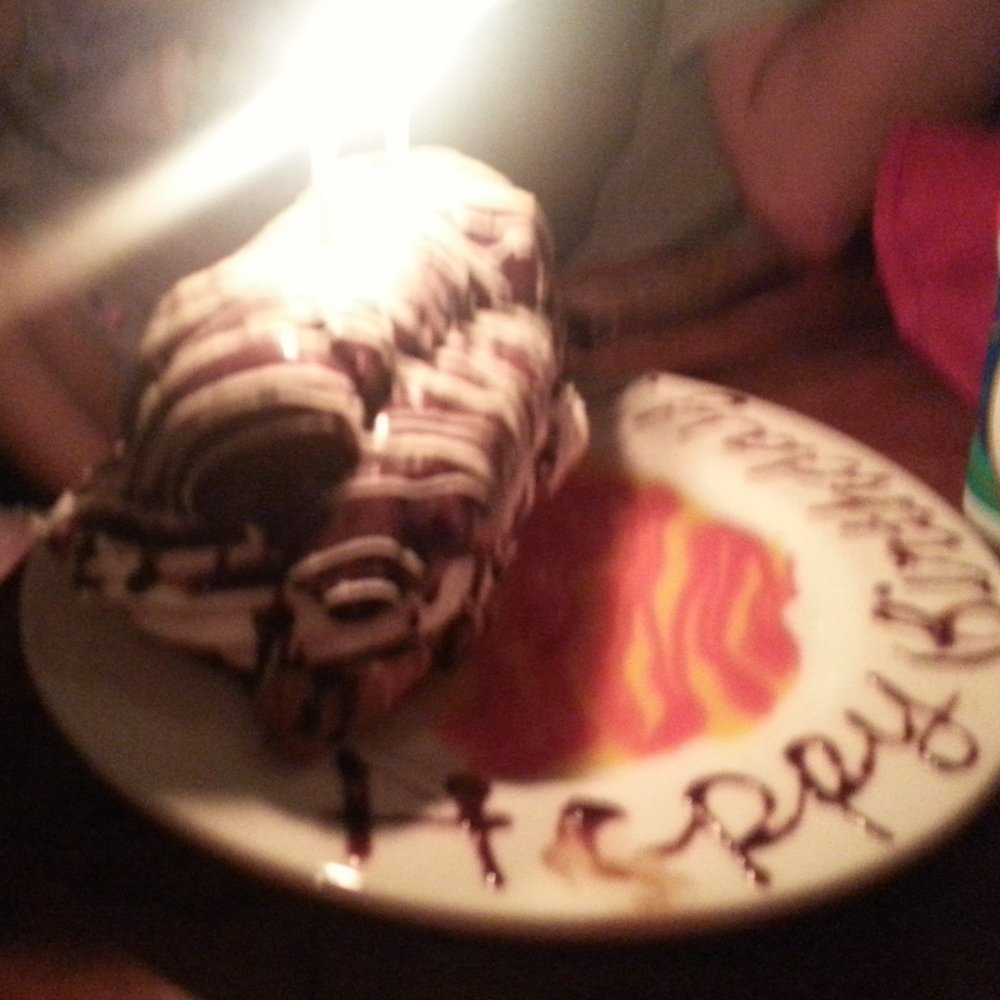 Rustler's Rooste - birthday football-sized eclair. - Steakhouses Near Me - Phoenix, Arizona