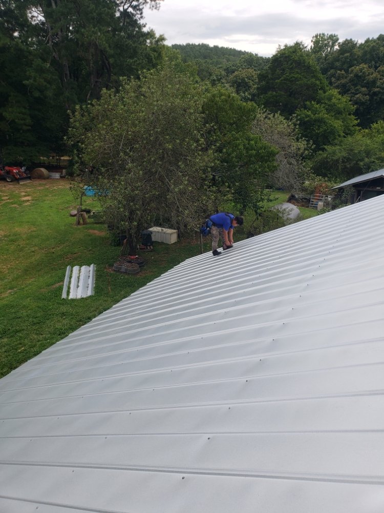 Slide of Real Deal Roofing