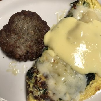 Left Fork Grill - Spinach, bacon, gruyere cheese omelette w/ hollandaise sauce. Sub potatoes and toast for a house made sausage patty. - Diners Near Me - Murray, Utah Left Fork Grill - Spinach, bacon, gruyere cheese omelette w/ hollandaise sauce. Sub potatoes and toast for a house made sausage patty. - Diners Near Me - Murray, Utah