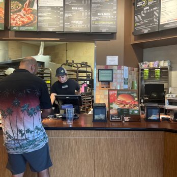 Panera Bread - a man standing at a counter in a restaurant - Sandwiches Near Me - Woodbridge, New Jersey Panera Bread - a man standing at a counter in a restaurant - Sandwiches Near Me - Woodbridge, New Jersey
