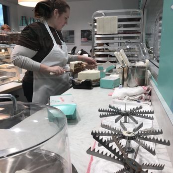 SusieCakes - Cutting up a slice of Carrot cake... which has raisins... - Bakeries Near Me - Long Beach, California SusieCakes - Cutting up a slice of Carrot cake... which has raisins... - Bakeries Near Me - Long Beach, California
