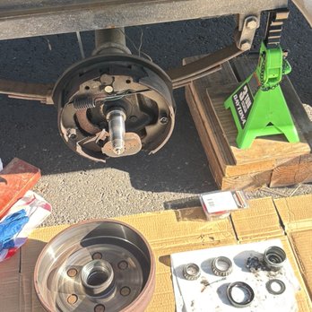 Innovative RV Service - Axle hub disassembled for inspection and repair. - RV Repair Near Me Innovative RV Service - Axle hub disassembled for inspection and repair. - RV Repair Near Me