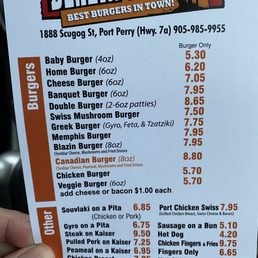 a hand holding a menu a hand holding a menu