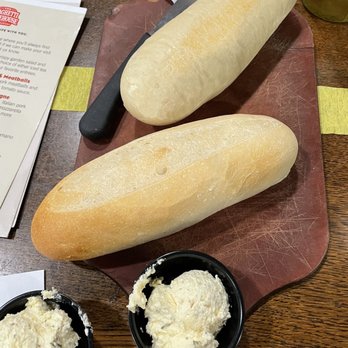 Spaghetti Warehouse - Fresh and hot sourdough bread and seasoned butter - Italian Near Me - Akron, Ohio Spaghetti Warehouse - Fresh and hot sourdough bread and seasoned butter - Italian Near Me - Akron, Ohio