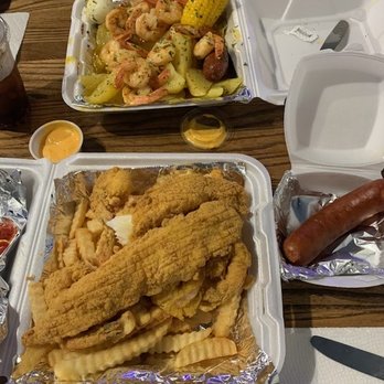 Krustaceans Seafood - Top: Shrimp boil Bottom: Fried Fish, Shrimp, & Chips Combo - Seafood Near Me - Nashville, Tennessee Krustaceans Seafood - Top: Shrimp boil Bottom: Fried Fish, Shrimp, & Chips Combo - Seafood Near Me - Nashville, Tennessee