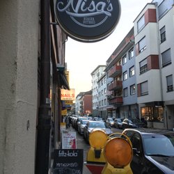 Nisa's Hot Dog Store - Blink and you'll miss it, right on the way to Paradeplatz from the University.