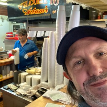 Adams Sandwich Shoppe - A shot of the owner working the grill - Breakfast & Brunch Near Me - Jacksonville, Florida