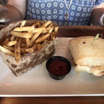 Rustic Root - Chicken sandwich with Parmesan fries - Cocktail Bars Near Me - San Diego, California Rustic Root - Chicken sandwich with Parmesan fries - Cocktail Bars Near Me - San Diego, California