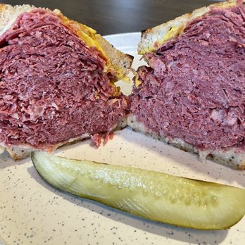 Slyman's Restaurant - The famous Corned Beef Sandwich with Swiss and mustard. - American Near Me - Cleveland, Ohio Slyman's Restaurant - The famous Corned Beef Sandwich with Swiss and mustard. - American Near Me - Cleveland, Ohio
