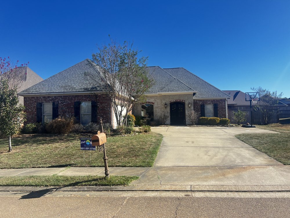 Slide of Scott Roofing