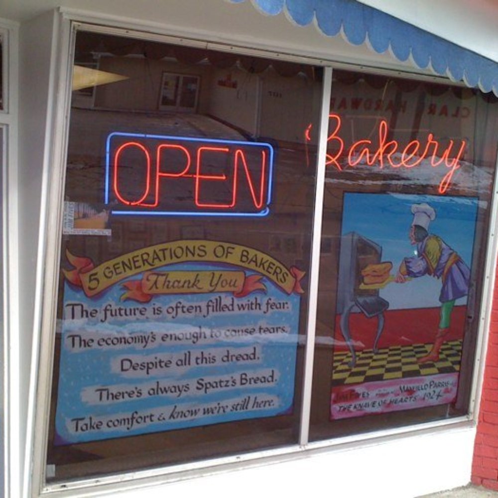 Spatz Bakery - open sign in window - Bakeries Near Me - Saginaw, Michigan