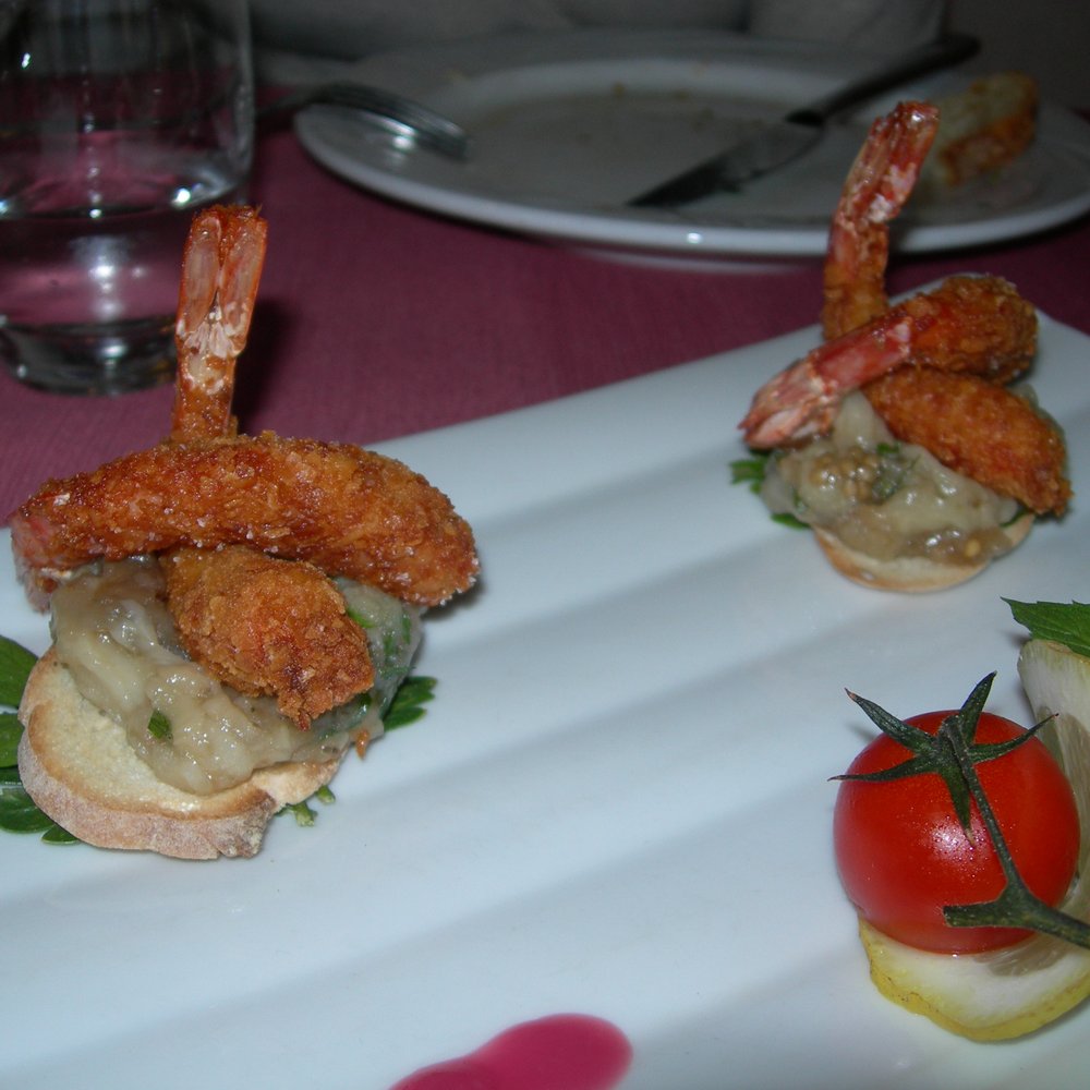 Il Corallo - July 10 2014; Prawn tails w. pane carasau breading, eggpant caviar/Code di gamberi con impanatura di pane carasau e melanzana. - Pizza Near Me - Alghero, SS