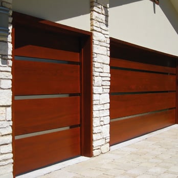 Swing Door Company - Stained Mahogany with Stainless Steel Inlay - Garage Door Services Near Me Swing Door Company - Stained Mahogany with Stainless Steel Inlay - Garage Door Services Near Me