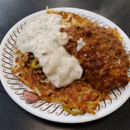 Bill Lewis of Vero Beach, Florida, making a quick stop at the Waffle House in Hendersonville, North Carolina. Bill Lewis of Vero Beach, Florida, making a quick stop at the Waffle House in Hendersonville, North Carolina.