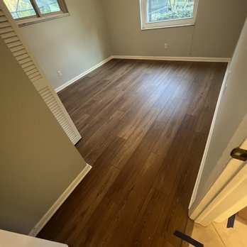 Falcon Flooring - a hardwood floor in an empty room - Flooring Near Me Falcon Flooring - a hardwood floor in an empty room - Flooring Near Me