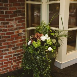 LaVassar Florists filled out existing planters to turn them into beautiful displays welcoming my wedding guests