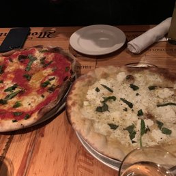 Margarita pizza and four cheese pizza- we ate for the 3 of us but I'd recommend more if you haven't eaten before. Margarita pizza and four cheese pizza- we ate for the 3 of us but I'd recommend more if you haven't eaten before.