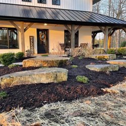 R&S Landscaping and Nursery - We had large stones in our forest that Roman incorporated into our landscaping design.