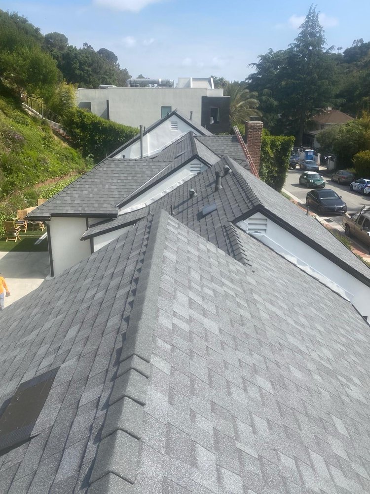 Slide of Alpha Roofing Group