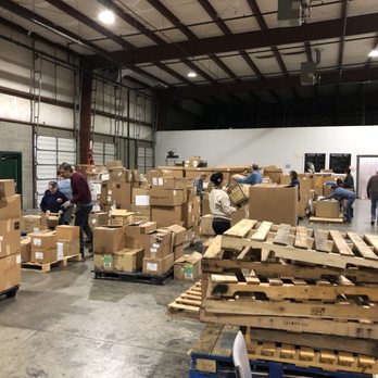 Project C.U.R.E Nashville Distribution Center - Donated Medical supplies ready to be sorted and stacked. - Community Service/Non-Profit Near Me - Nashville, Tennessee
