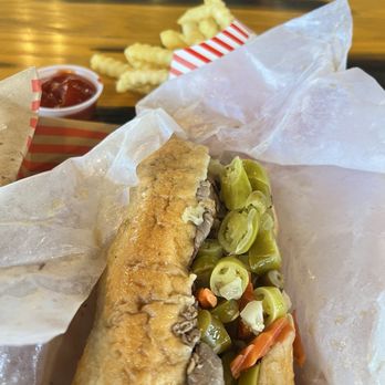 Portillo's Allen - Hot beef dipped in au juice with hot peppers, fries and a coke. - Burgers Near Me - Allen, Texas Portillo's Allen - Hot beef dipped in au juice with hot peppers, fries and a coke. - Burgers Near Me - Allen, Texas