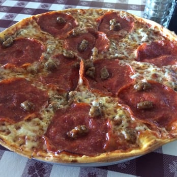 Minuteman Pizza Parlor - Small, thin crust, sausage and pepperoni. - Pizza Near Me - Sand Springs, Oklahoma Minuteman Pizza Parlor - Small, thin crust, sausage and pepperoni. - Pizza Near Me - Sand Springs, Oklahoma