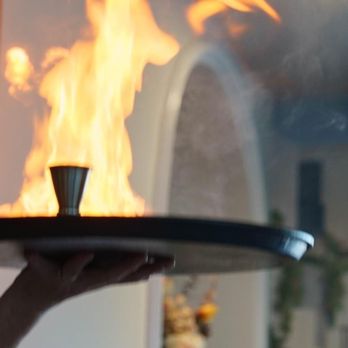Sotiris Authentic Greek Cuisine - Saganaki OPA! Flaming kefalatyri cheese. A crowd pleaser. - Greek Near Me - Burlington, Ontario Sotiris Authentic Greek Cuisine - Saganaki OPA! Flaming kefalatyri cheese. A crowd pleaser. - Greek Near Me - Burlington, Ontario