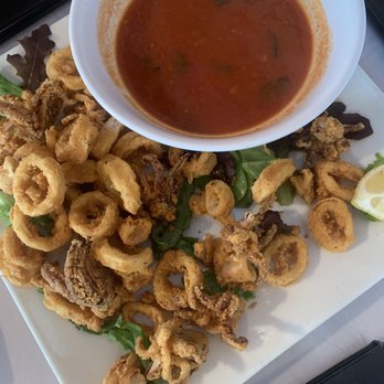 Rino's Place - Calamari (a few missing..forgot to take the picture before we started eating) - Italian Near Me - Boston, Massachusetts Rino's Place - Calamari (a few missing..forgot to take the picture before we started eating) - Italian Near Me - Boston, Massachusetts