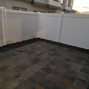 VanDorne Landscape and Design - Victorian pavers with graphite boarder and river rock.  Next comes the plants and furniture! - Landscaping Near Me