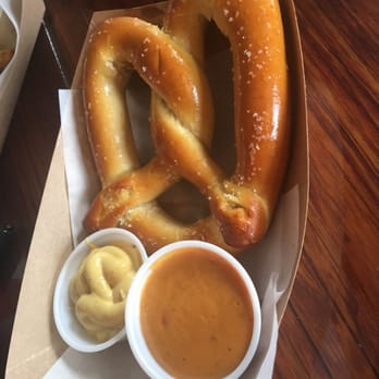 Henderson Heights - Big ass pretzel w/ queso & dijon mustard - Pubs Near Me - Houston, Texas Henderson Heights - Big ass pretzel w/ queso & dijon mustard - Pubs Near Me - Houston, Texas