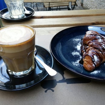 Fábrica Coffee Roasters - Coffee and chocolate crossiant in the morning. - Coffee Roasteries Near Me - Lisbon, 11 Fábrica Coffee Roasters - Coffee and chocolate crossiant in the morning. - Coffee Roasteries Near Me - Lisbon, 11