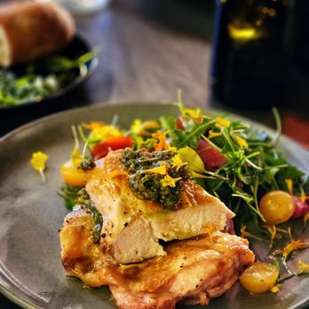 Small Barn - The Herb Roasted Petaluma Chicken. Topped with pistachio-basil pesto and a side of arugula and tomato salad. This was my fave! - New American Near Me - Temecula, California