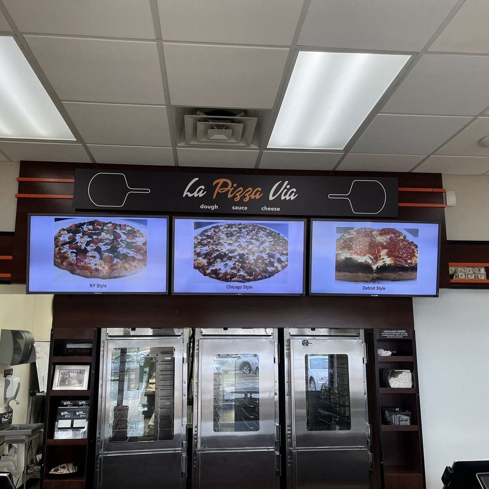 La Pizza Via - pizzas on display in a restaurant - Pizza Near Me - Fox River Grove, Illinois