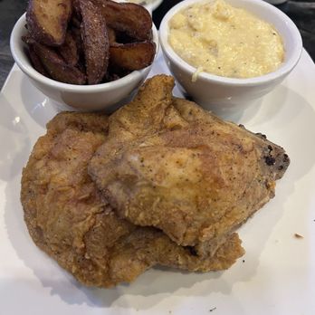 Urban Bar & Kitchen - Fried pork chops with red skinned potatoes and grits. - American Near Me - Tuscaloosa, Alabama Urban Bar & Kitchen - Fried pork chops with red skinned potatoes and grits. - American Near Me - Tuscaloosa, Alabama